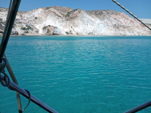 A Greek Water Yachts monohull anchored in the crystal-clear turquoise waters of Kato Koufonisi, showcasing the ultimate silent anchorage for a 2026 wellness sailing retreat in the Minor Cyclades.